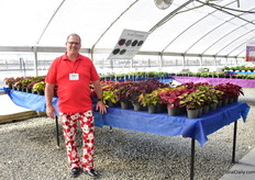 Troy Lucht of Plant Source International in front of the Heugera varieties they grow. They grow unrooted cuttings to the North American market and have production sites in Mexico and in the U.S. This year, they will add the Suntory breeder line to their list.